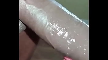 Slut swallowing a big black dick deep down her throat