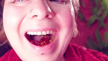 Eating jelly teddybears candies chewing mouth close up