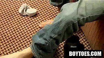 Amateur Stud Rubbing His Feet Before Tugging His Cock thumbnail