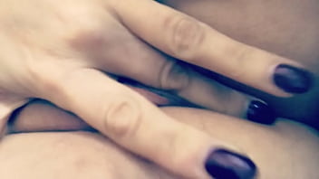 Milf shows off pussy and rubs it