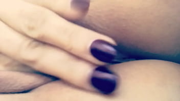 Milf shows off pussy and rubs it