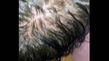 Blowing using a vibrator on her pussy