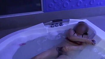Beautiful stepmother in the motel jacuzzi masturbates before fucking her