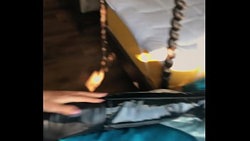 Woman in fetish gear showing off in window