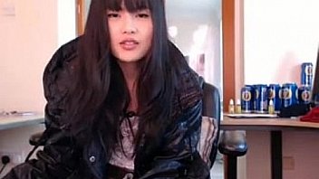 Hot sexy asian camgirl playing with her toy in office