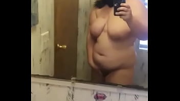 Girl wearing mask rubbing herself