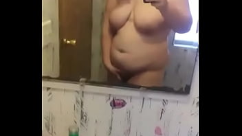 Girl wearing mask rubbing herself