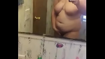 Girl wearing mask rubbing herself