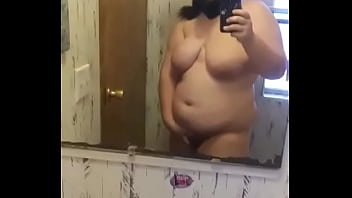 Girl wearing mask rubbing herself