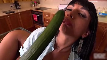 Cucumber in wet pussy