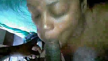 Busty black babe sucks hubbys huge black cock