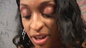 Ebony teen cleaning all the cocks at gloryhole 9