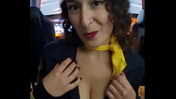 The flight attendant puts a dildo in her pussy on board