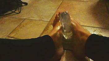 Ariel ortiz plays with her feet with her toy