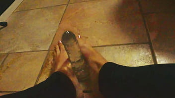 Ariel ortiz plays with her feet with her toy