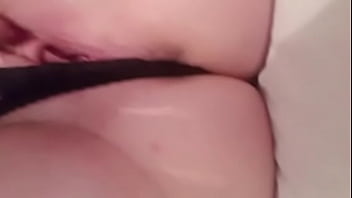 Whore finger fucks her cunt in black panties
