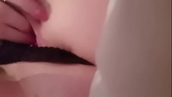 Whore finger fucks her cunt in black panties