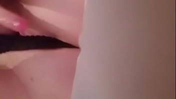 Whore finger fucks her cunt in black panties