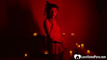 Solo redhead masturbates in the red light