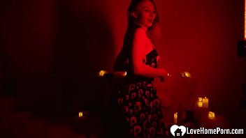 Solo redhead masturbates in the red light