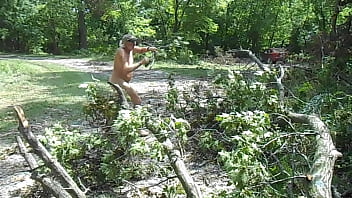 Naked Driver Removes Fallen Limbs From A Gravel Road Naked thumbnail