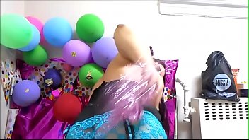 Ginger paris stimulates her pussy with balloons holder & glass