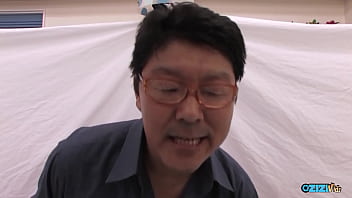 A multitude of individuals of various genders engaged in an oral orgy