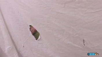 A multitude of individuals of various genders engaged in an oral orgy