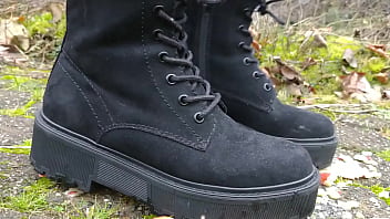 Woman crush apple underfeet