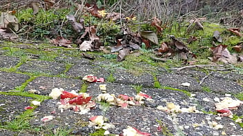 Woman crush apple underfeet