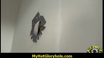 Sucking cock trough a gloryhole 22
