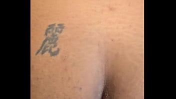 Hot ebony slut fingers her pussy and plays with her pierced clit