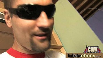 Huge cocks cover their black face in cum 18