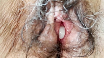 He slowly pumped his cum into me and then jumped off me to take a video of my freshly fucked hairy pussy