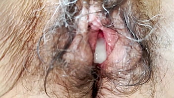 He slowly pumped his cum into me and then jumped off me to take a video of my freshly fucked hairy pussy