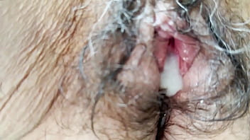 He slowly pumped his cum into me and then jumped off me to take a video of my freshly fucked hairy pussy