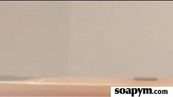 Babe gives erotic soapy massage 26