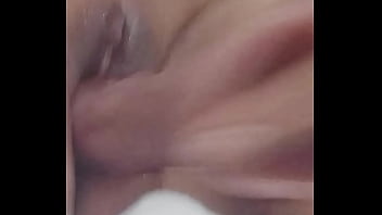 Playing with my mature neighbor's pussy with a huge dildo and making her cum in spurts