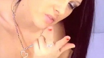 Hot brunette with black stockings play with pussy