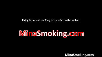 Nasty brunette hoe smokes a cigarette