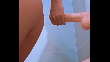 Curvy latina goddess rides her toy from behind