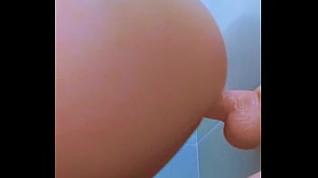 Curvy latina goddess rides her toy from behind