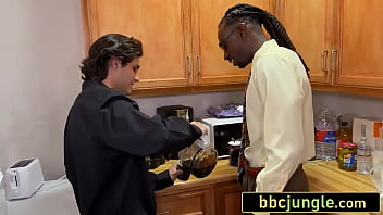 Busty redhead boss takes a thick black cock on her desk