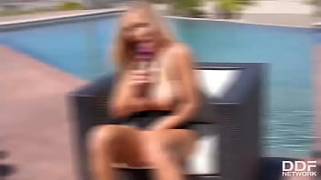 Sunny sexual sa busty blonde masturbates by the pool