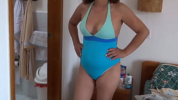 Beautiful 59 year old mature latina puts on a bikini to show off on the beach