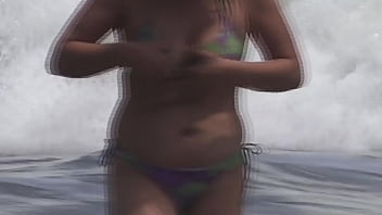 Beautiful 59 year old mature latina puts on a bikini to show off on the beach