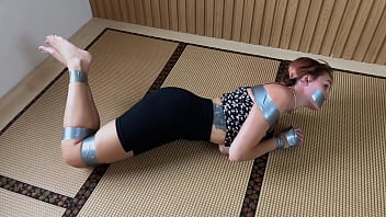 Look at this redhead's feet while she's ducttaped