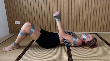 Look at this redhead's feet while she's ducttaped