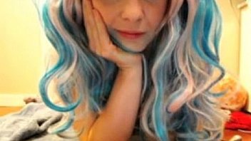 Blonde girl squirts on cam with blue white hair