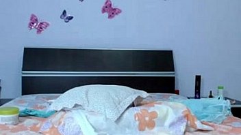 Busty and sexy masturbates with a dildo front the webcam